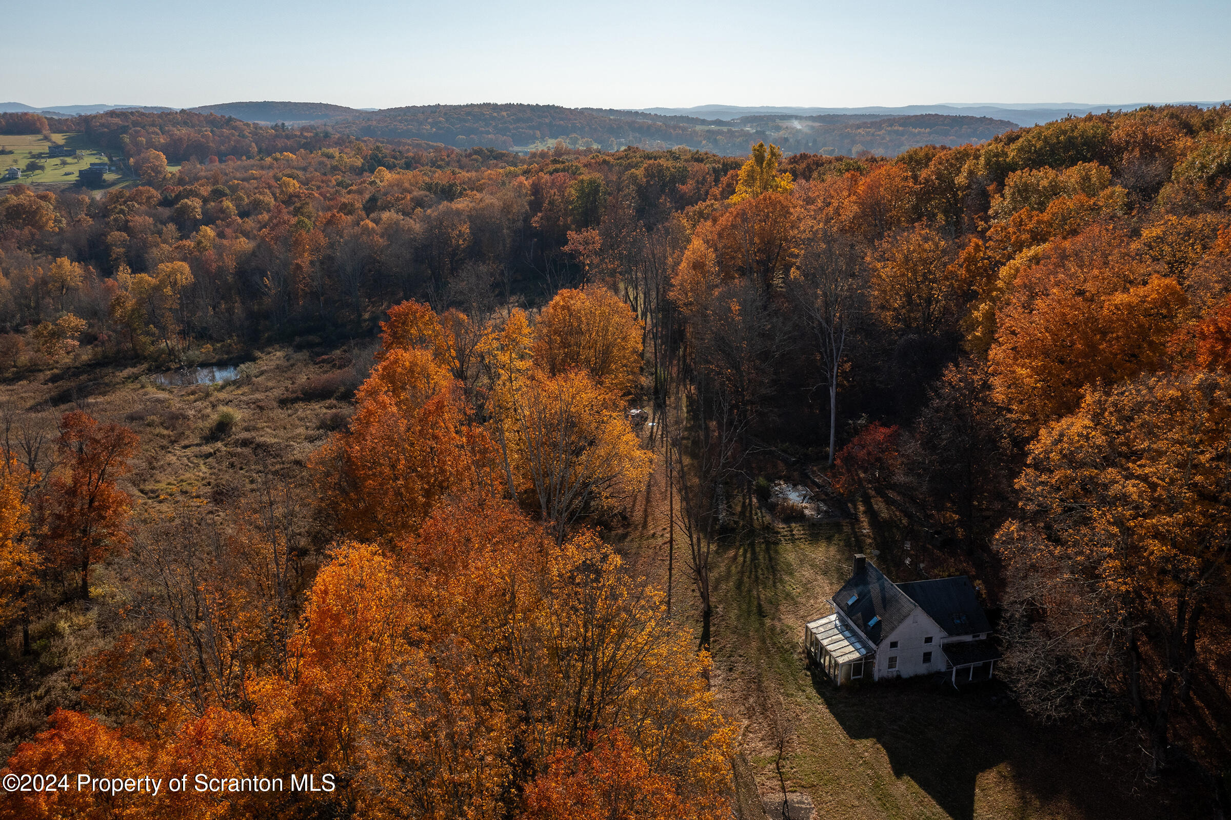 1736 Falls Road Clarks Summit, PA 18411 - Photo 8 of 26 a view of lake and mountain
