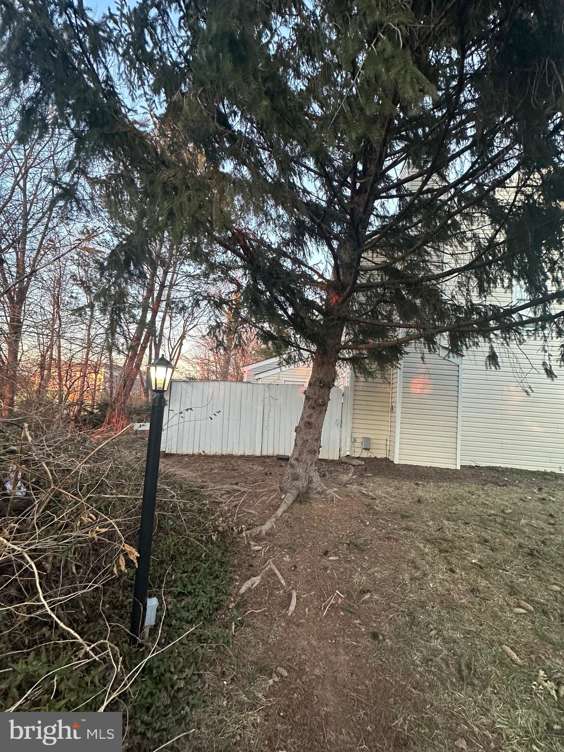 326 Lancaster Square, Unit 326 Sterling, VA 20164 - Photo 27 of 30 a view of a house with a yard