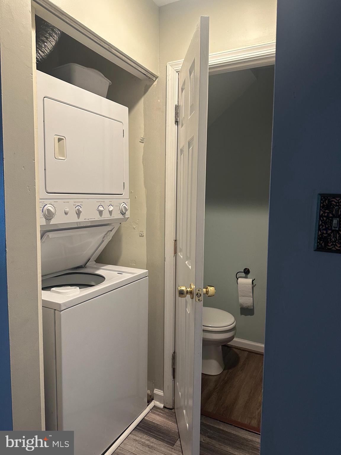 326 Lancaster Square, Unit 326 Sterling, VA 20164 - Photo 30 of 30 a bathroom with a granite countertop toilet sink and mirror