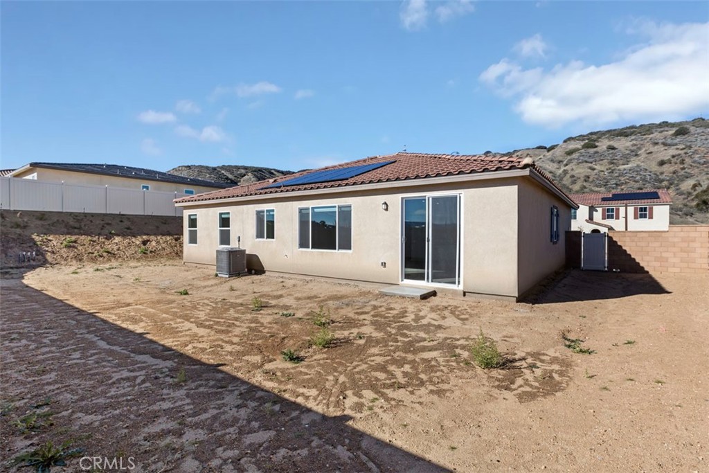 1218 Butterfly Way Banning, CA 92220 - Photo 13 of 16 a view of a house with snow on the background