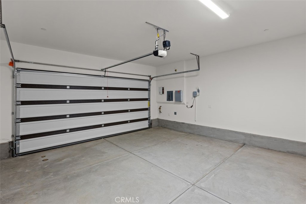 1218 Butterfly Way Banning, CA 92220 - Photo 14 of 16 a view of an empty room with a cabinet