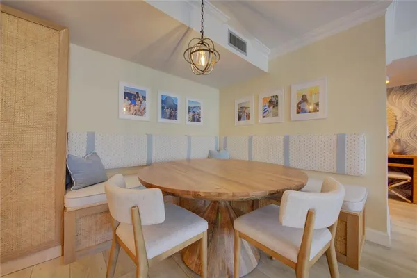 a spacious bedroom with a bed and a couch