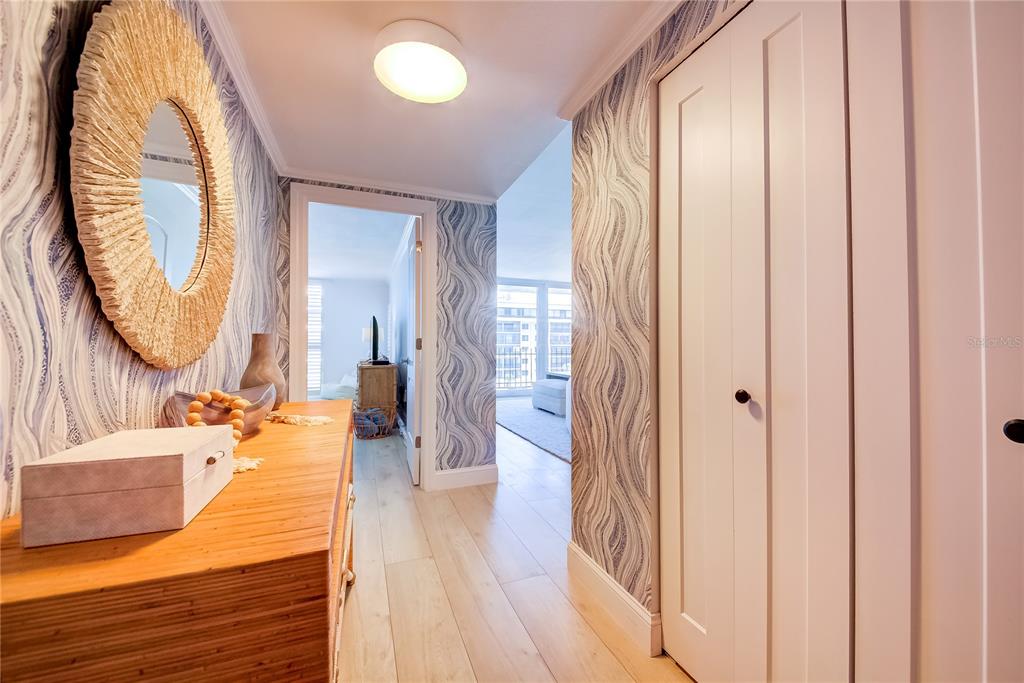 1212 Benjamin Franklin Drive, Unit 504 Sarasota, FL 34236 - Photo 6 of 48 a view of a living room and bathroom