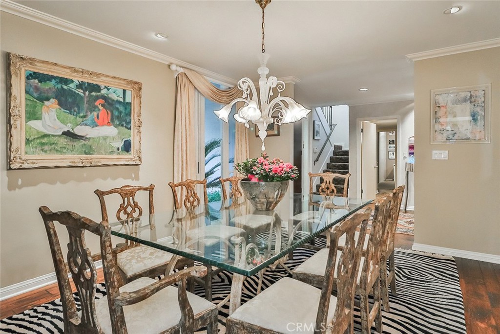 4575 De Celis Place Encino, CA 91436 - Photo 20 of 63 a view of a dining room with furniture and chandelier