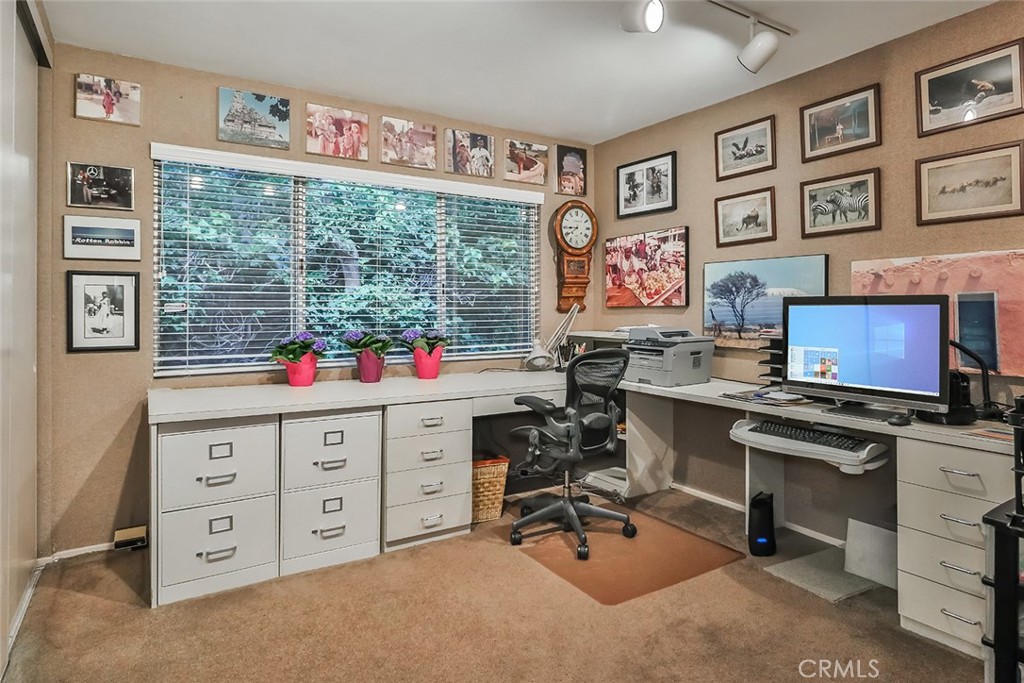 4575 De Celis Place Encino, CA 91436 - Photo 29 of 63 a view of workspace with painting on the wall