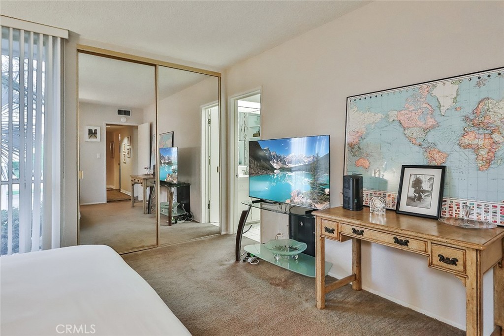 4575 De Celis Place Encino, CA 91436 - Photo 36 of 63 a living room with stainless steel appliances kitchen island granite countertop furniture and a kitchen view