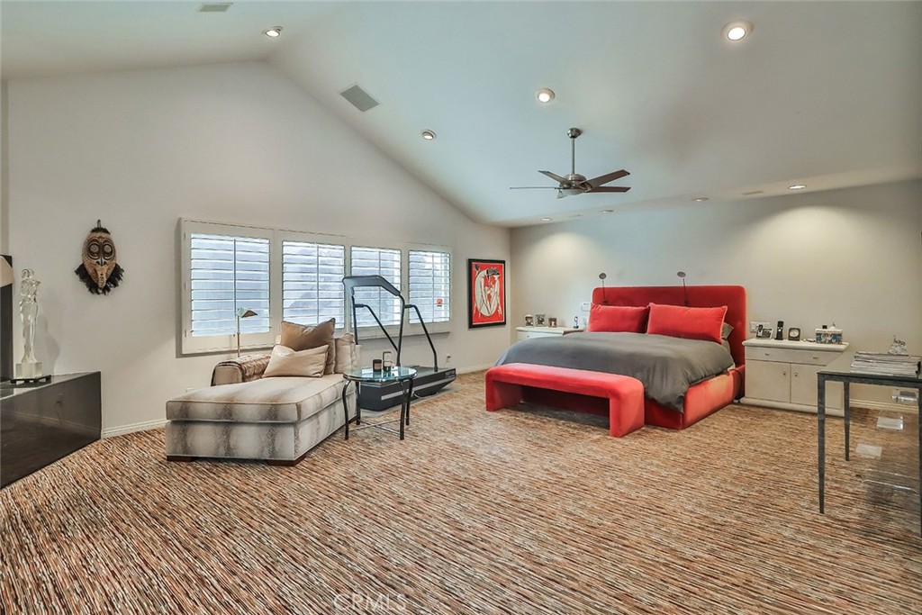 4575 De Celis Place Encino, CA 91436 - Photo 41 of 63 a bedroom with furniture and wooden floor