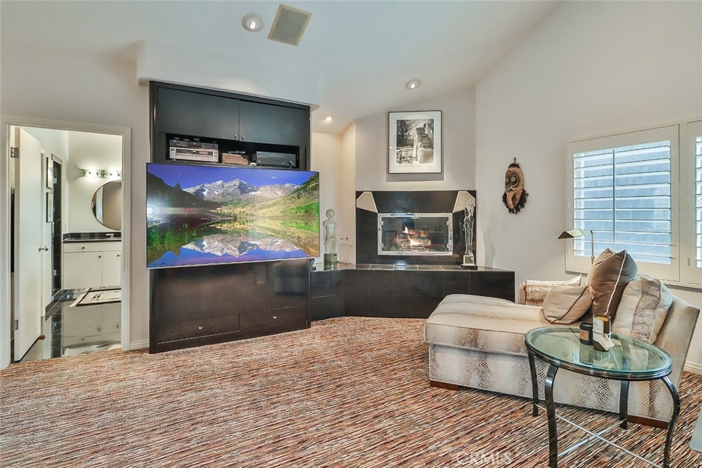 4575 De Celis Place Encino, CA 91436 - Photo 44 of 63 a living room with furniture and a flat screen tv