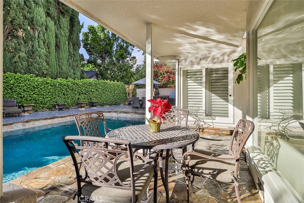 4575 De Celis Place Encino, CA 91436 - Photo 58 of 63 a view of an outdoor dining space with furniture and garden view