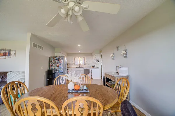 a view of a dining room with furniture
