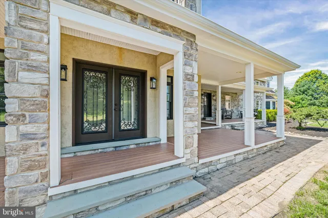 a kitchen with stainless steel appliances granite countertop a stove and a sink