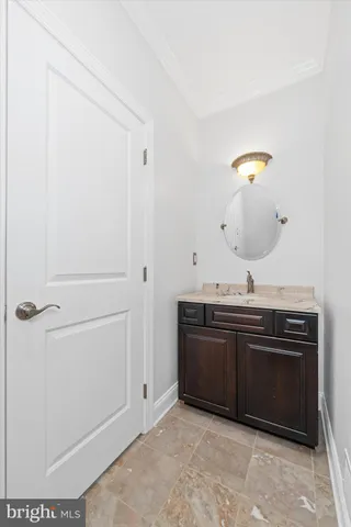 a view of a livingroom with furniture and natural light