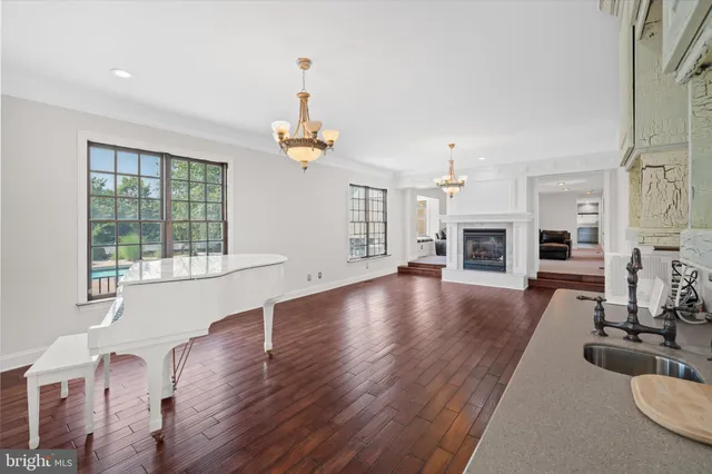 a view of walk in closet and empty room