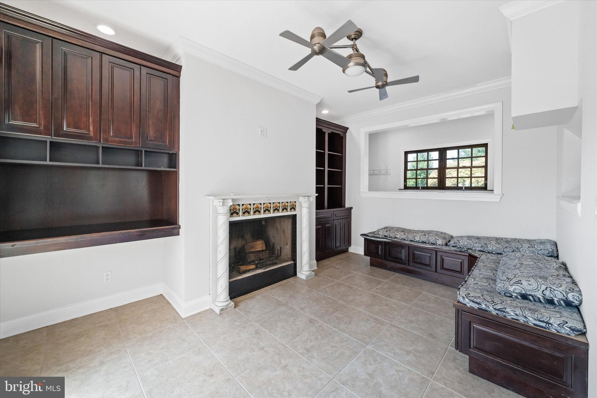 2159 McCoy Road Bear, DE 19701 - Photo 40 of 110 a living room with furniture and a fireplace