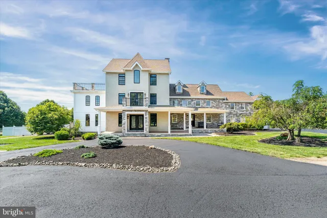 an aerial view of a house with a garden