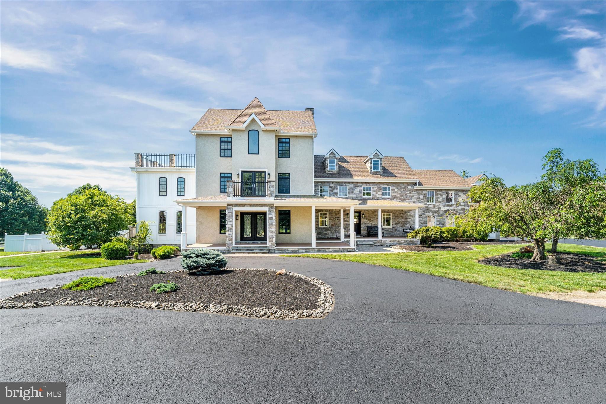 2159 McCoy Road Bear, DE 19701 - Photo 4 of 110 a front view of a residential apartment building with a yard