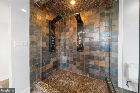 an aerial view of a residential houses with outdoor space