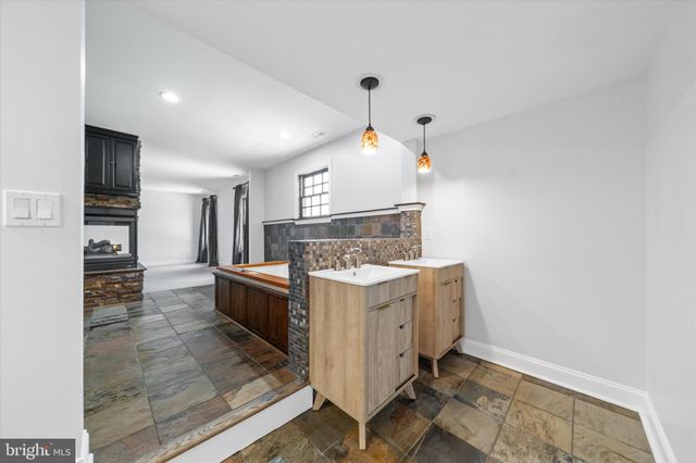 a black and white photo of a living room