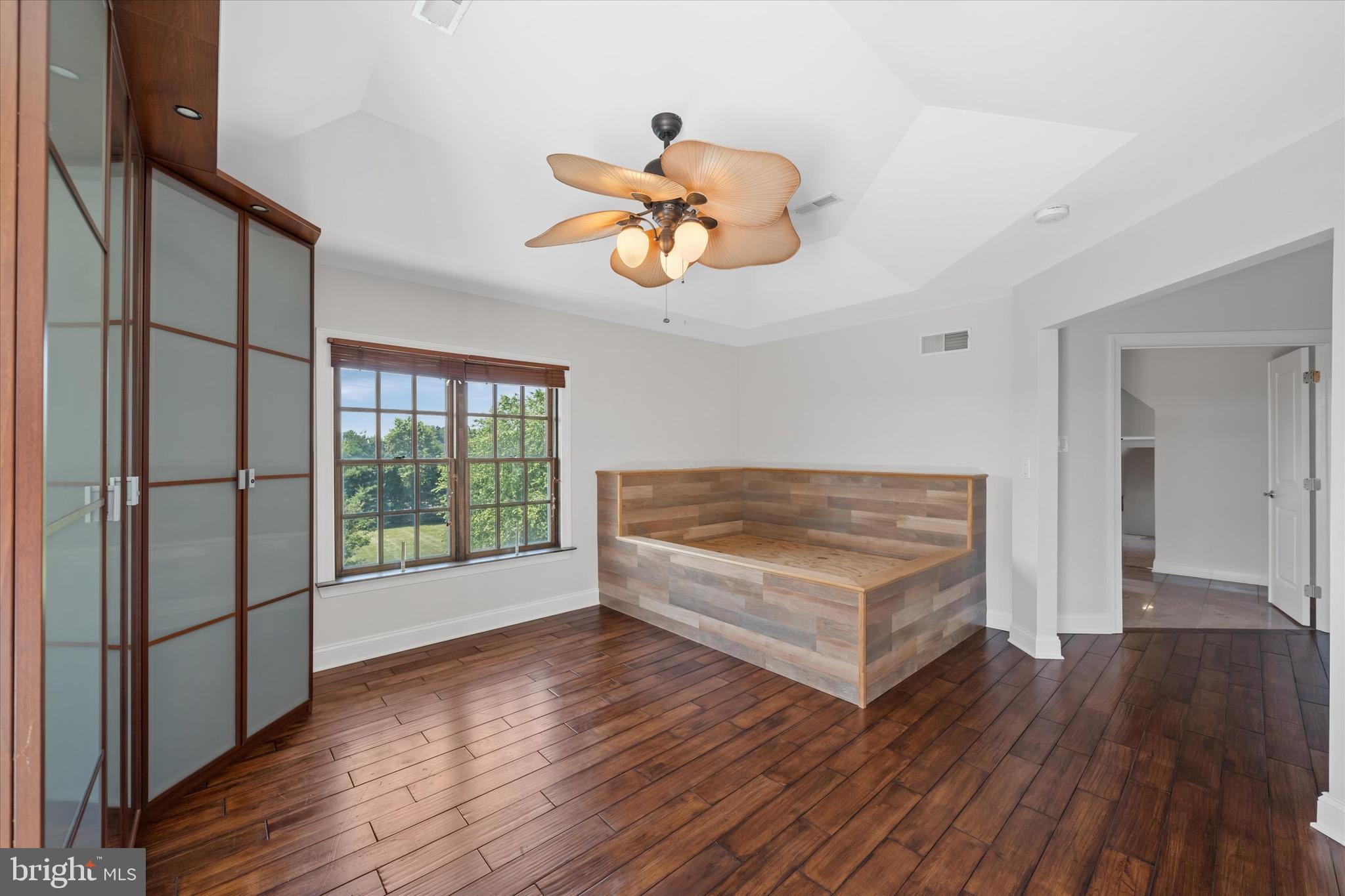 2159 McCoy Road Bear, DE 19701 - Photo 67 of 110 a living room with hard wood floors and a ceiling fan