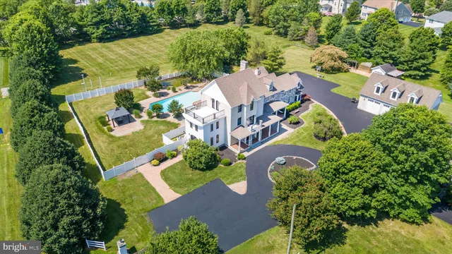 a view of a porch with wooden floor and floor to ceiling window