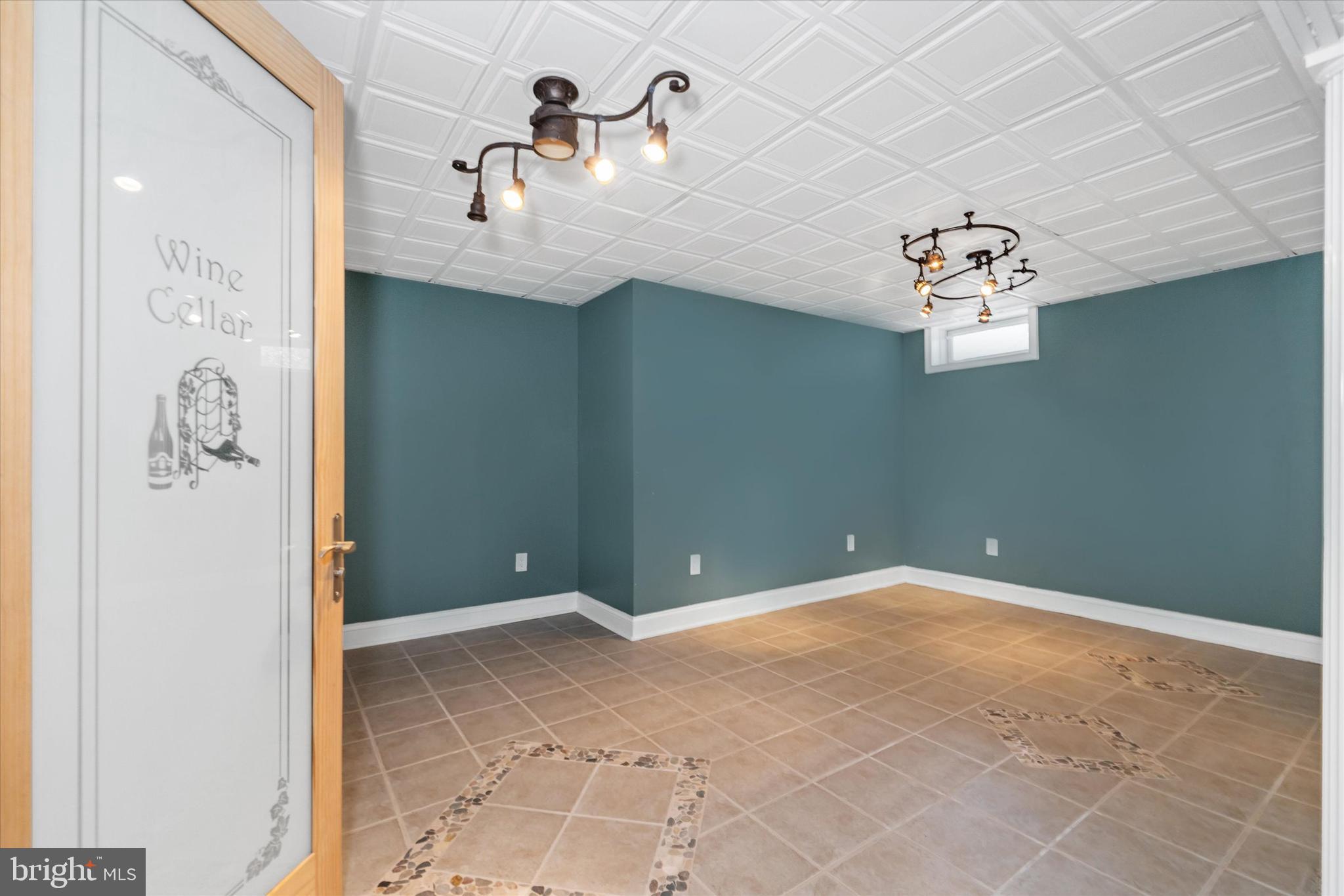 2159 McCoy Road Bear, DE 19701 - Photo 77 of 110 a view of a chandelier fan and windows
