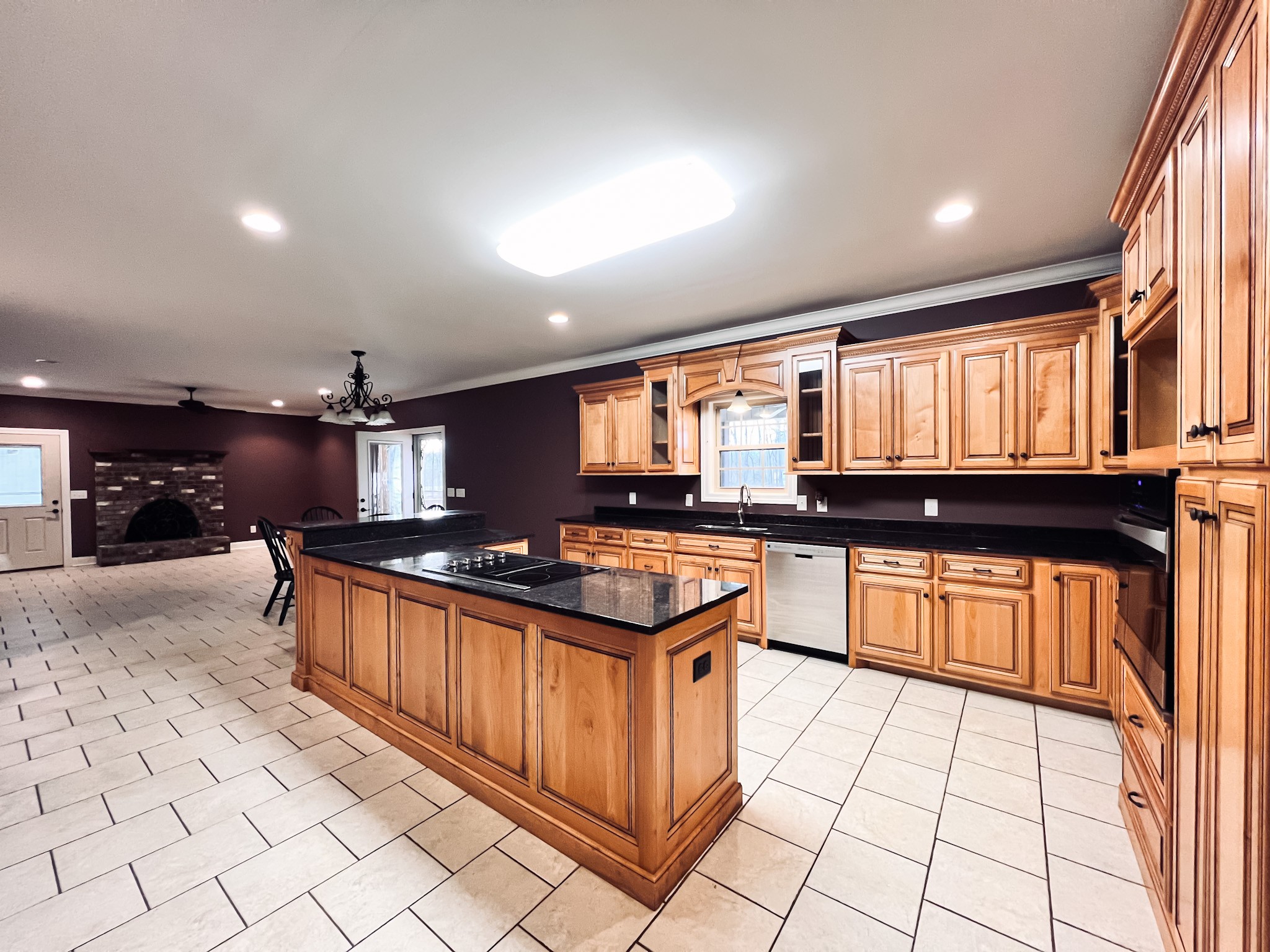 33 Hester Road Leoma, TN 38468 - Photo 20 of 52 a kitchen with stainless steel appliances granite countertop a stove a sink and a refrigerator