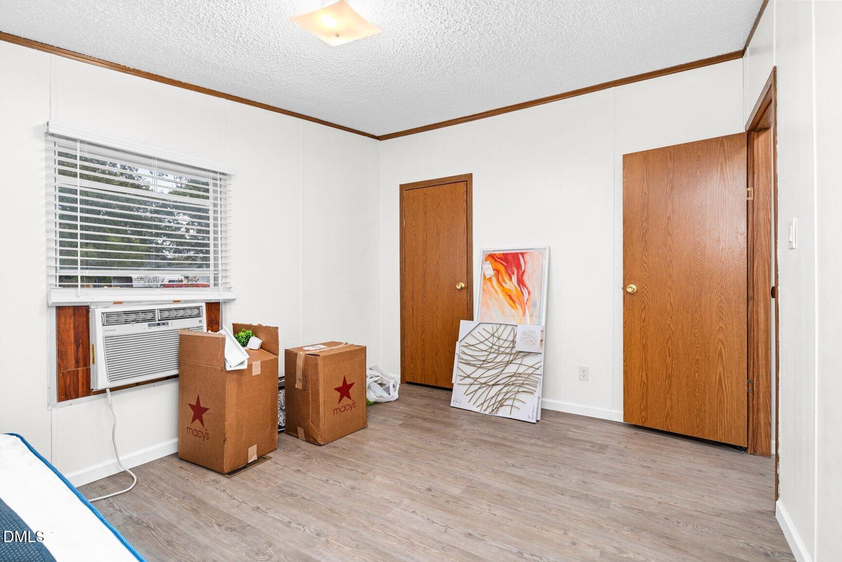 1835 Cokey Road Rocky Mount, NC 27801 - Photo 22 of 42 a view of a livingroom with wooden floor