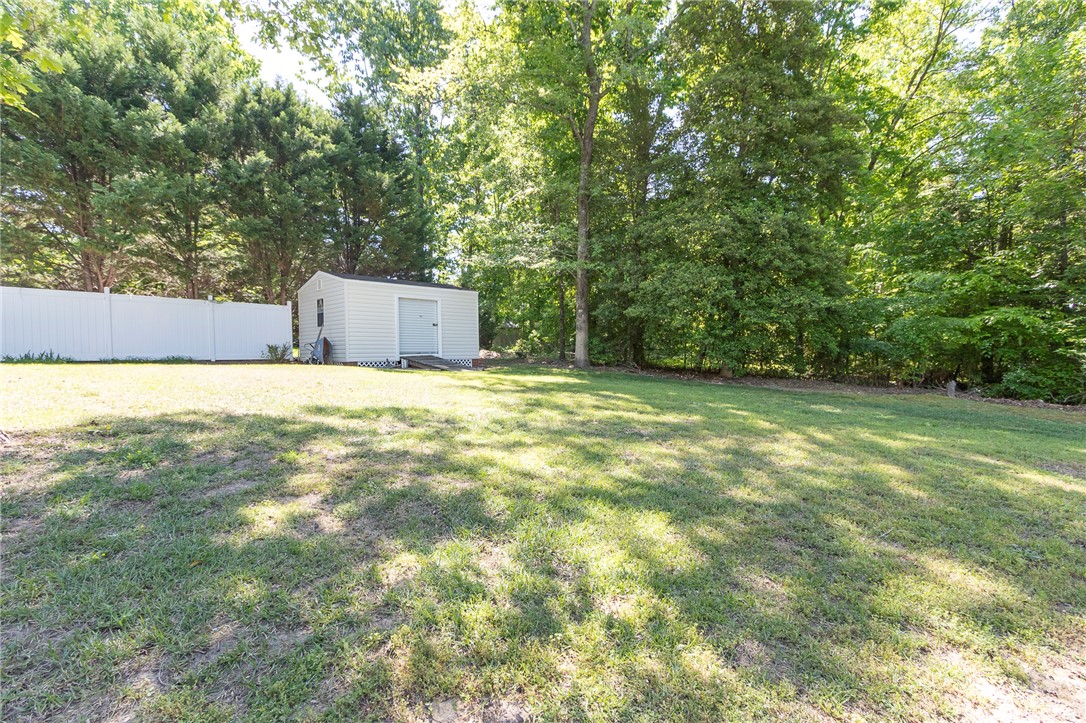 151 Hannah Circle Anderson, SC 29621 - Photo 38 of 46 This spacious yard features a practical shed and privacy fencing, ideal for outdoor living.