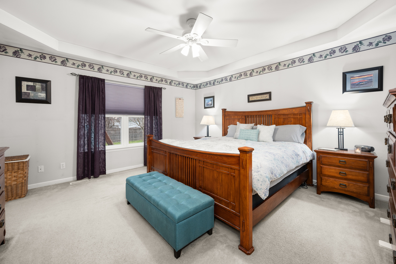 1277 Ryan Court DeKalb, IL 60115 - Photo 20 of 37 a bedroom with a bed and a chandelier