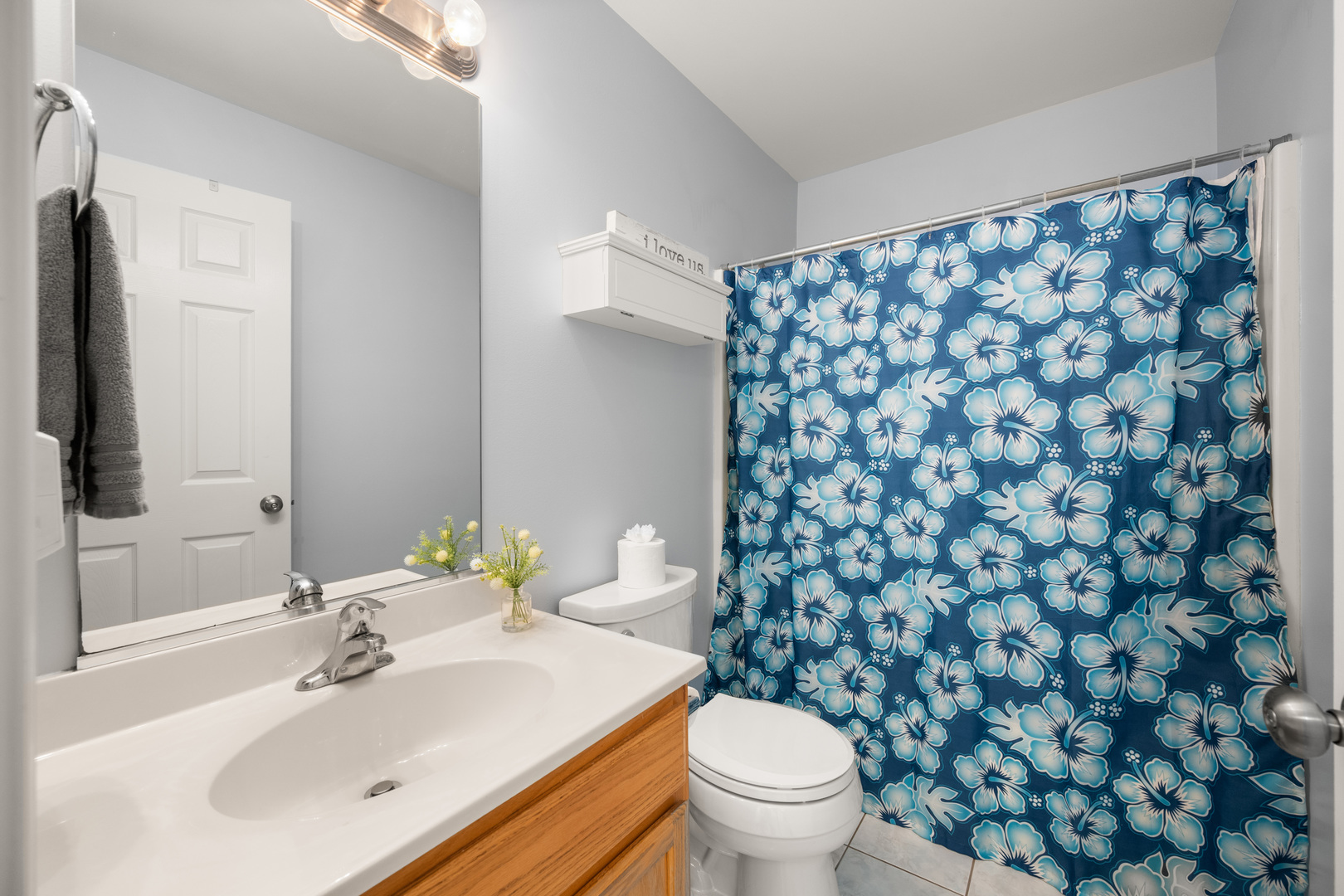 1277 Ryan Court DeKalb, IL 60115 - Photo 25 of 37 a bathroom with a sink toilet and a mirror
