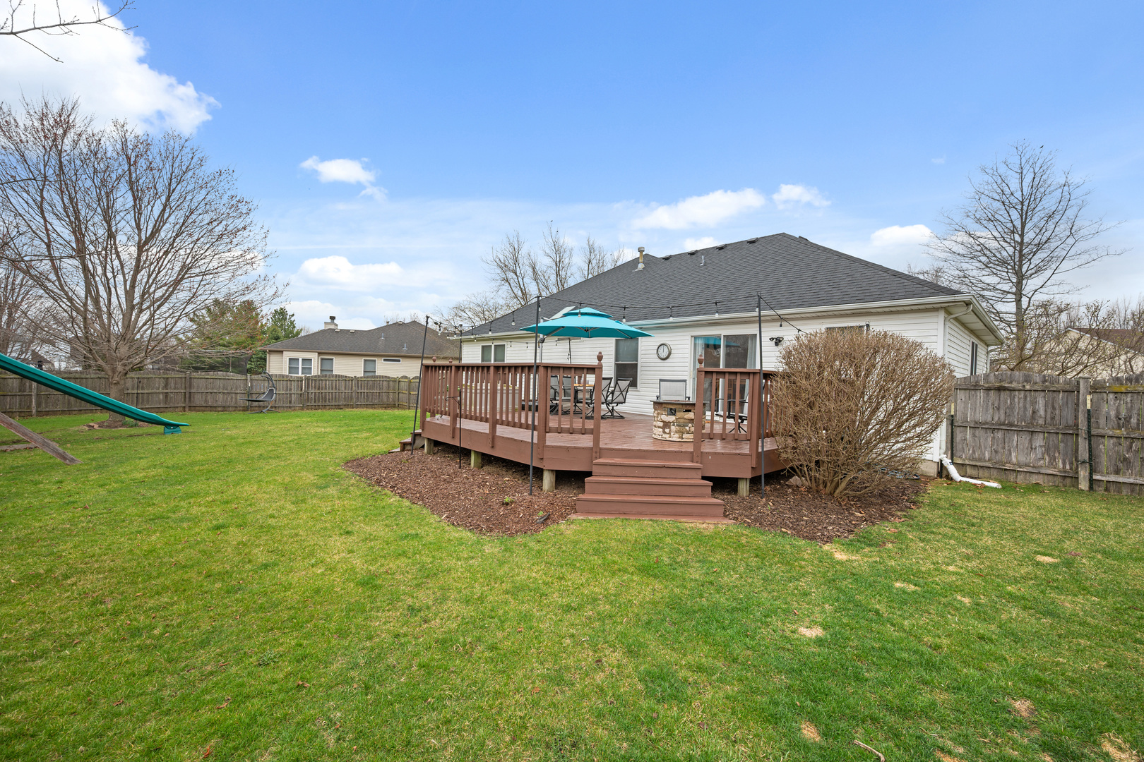 1277 Ryan Court DeKalb, IL 60115 - Photo 4 of 37 a view of a house with backyard and sitting area