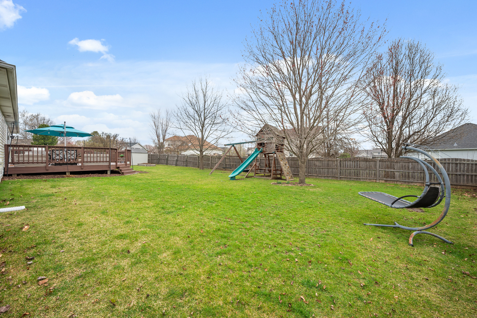 1277 Ryan Court DeKalb, IL 60115 - Photo 9 of 37 a view of a table and chairs in the garden