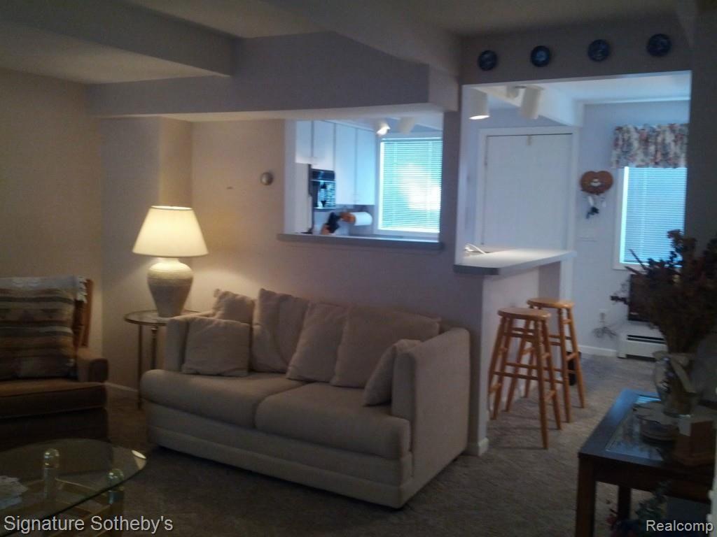 13456 Stover Road, Unit 3 Charlevoix, MI 49720 - Photo 6 of 16 Kitchen and Dining open to Living Room.
