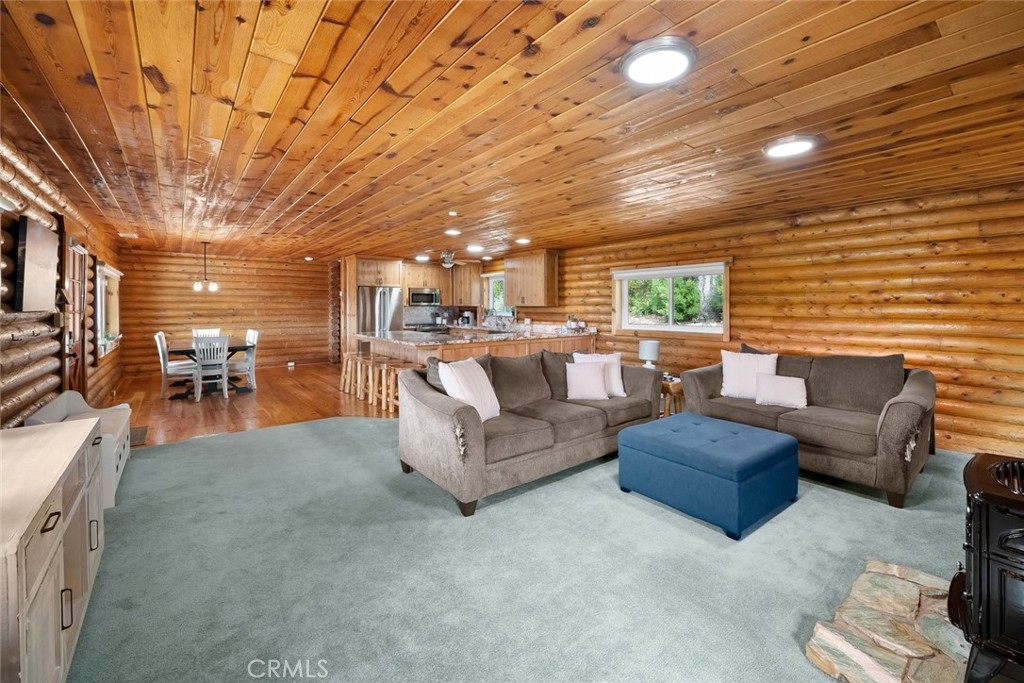4620 Obispo Road Atascadero, CA 93422 - Photo 12 of 50 a living room with furniture and a large window