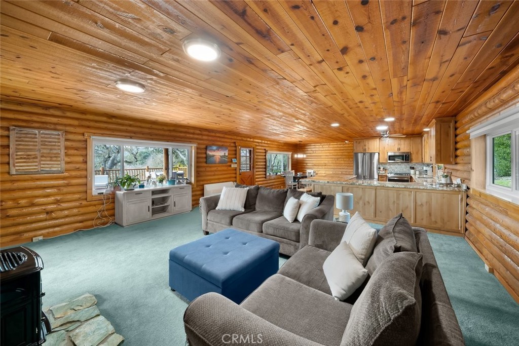 4620 Obispo Road Atascadero, CA 93422 - Photo 13 of 50 a living room with furniture and a large window