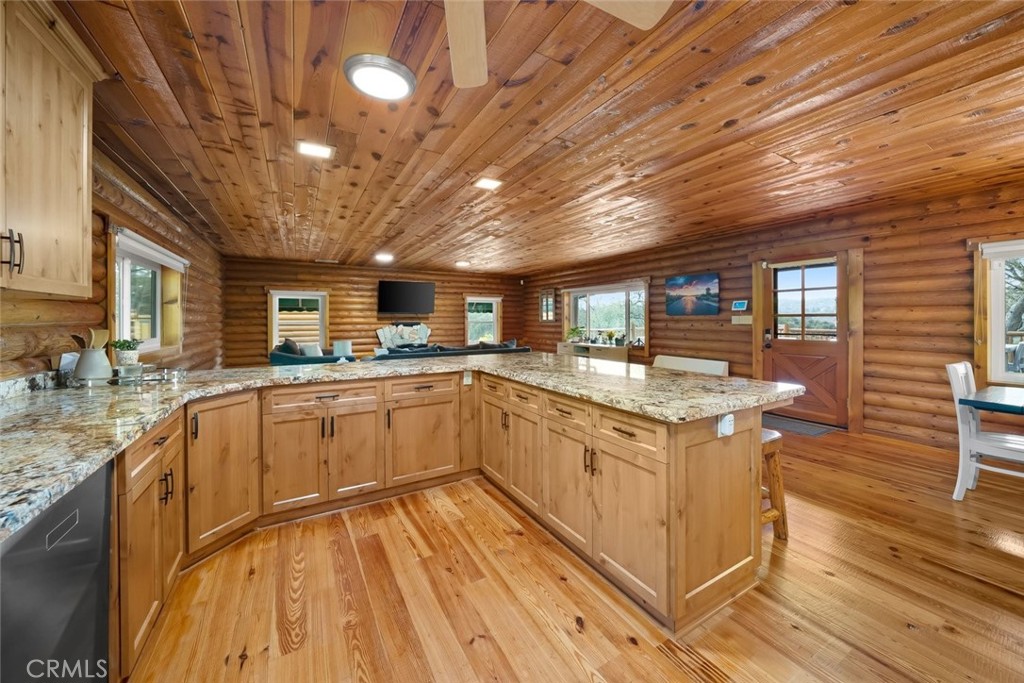 4620 Obispo Road Atascadero, CA 93422 - Photo 15 of 50 a kitchen with stainless steel appliances granite countertop a sink and cabinets