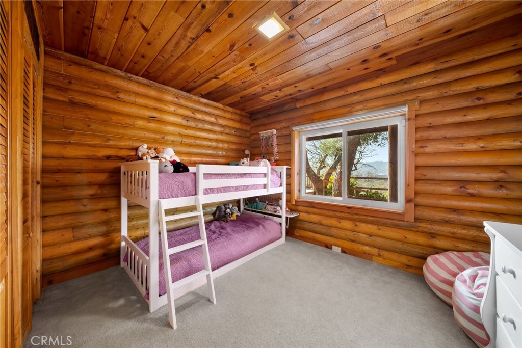 4620 Obispo Road Atascadero, CA 93422 - Photo 26 of 50 a bedroom with bunk bed and a window