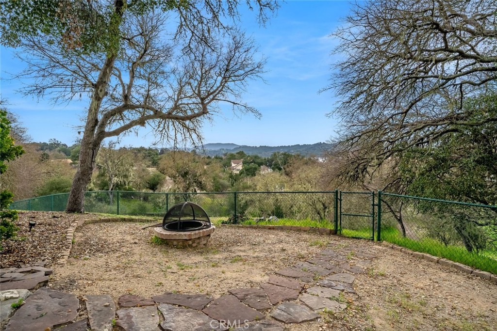 4620 Obispo Road Atascadero, CA 93422 - Photo 37 of 50 a backyard of a house with lots of green space
