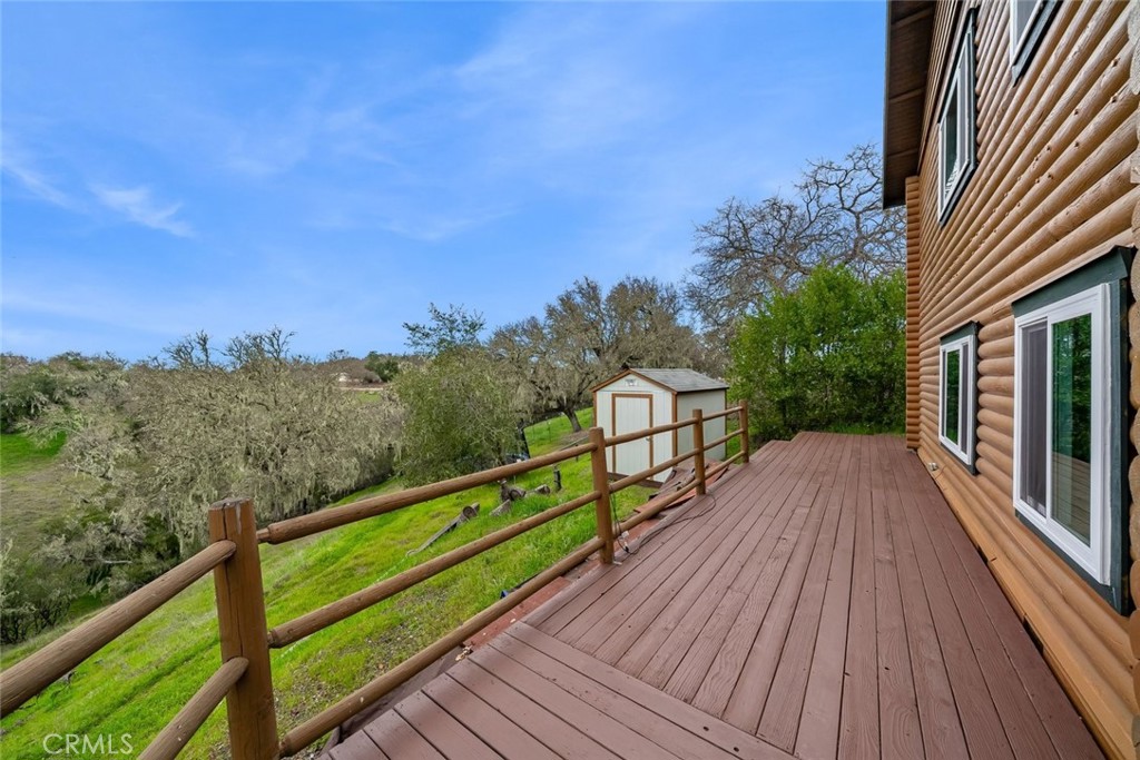 4620 Obispo Road Atascadero, CA 93422 - Photo 39 of 50 a view of a balcony with wooden floor and fence