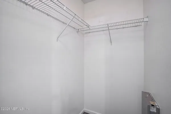 a view of a room with racks on the wall