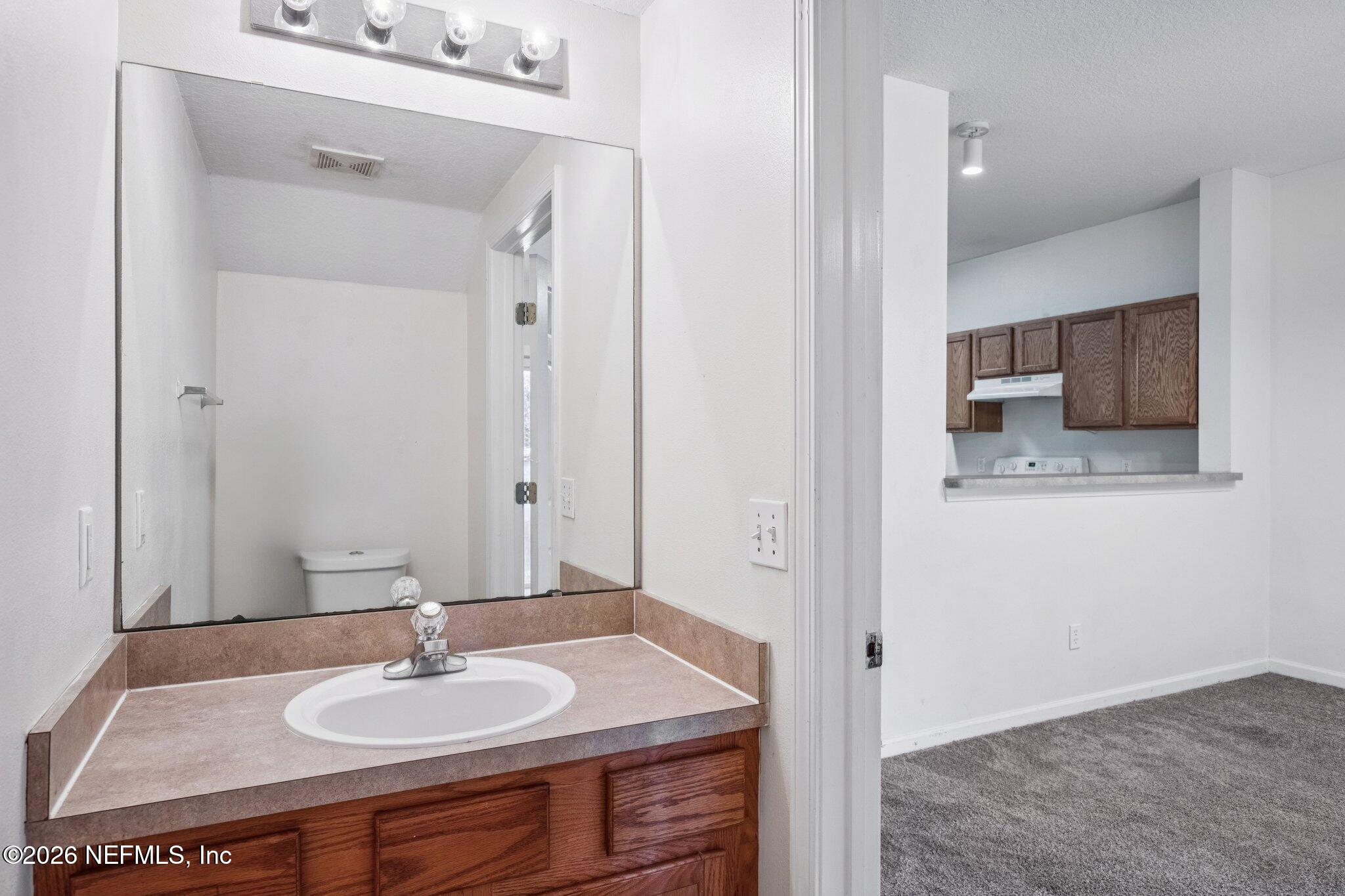 7818 Melvin Road Jacksonville, FL 32210 - Photo 29 of 34 Downstairs Half Bath