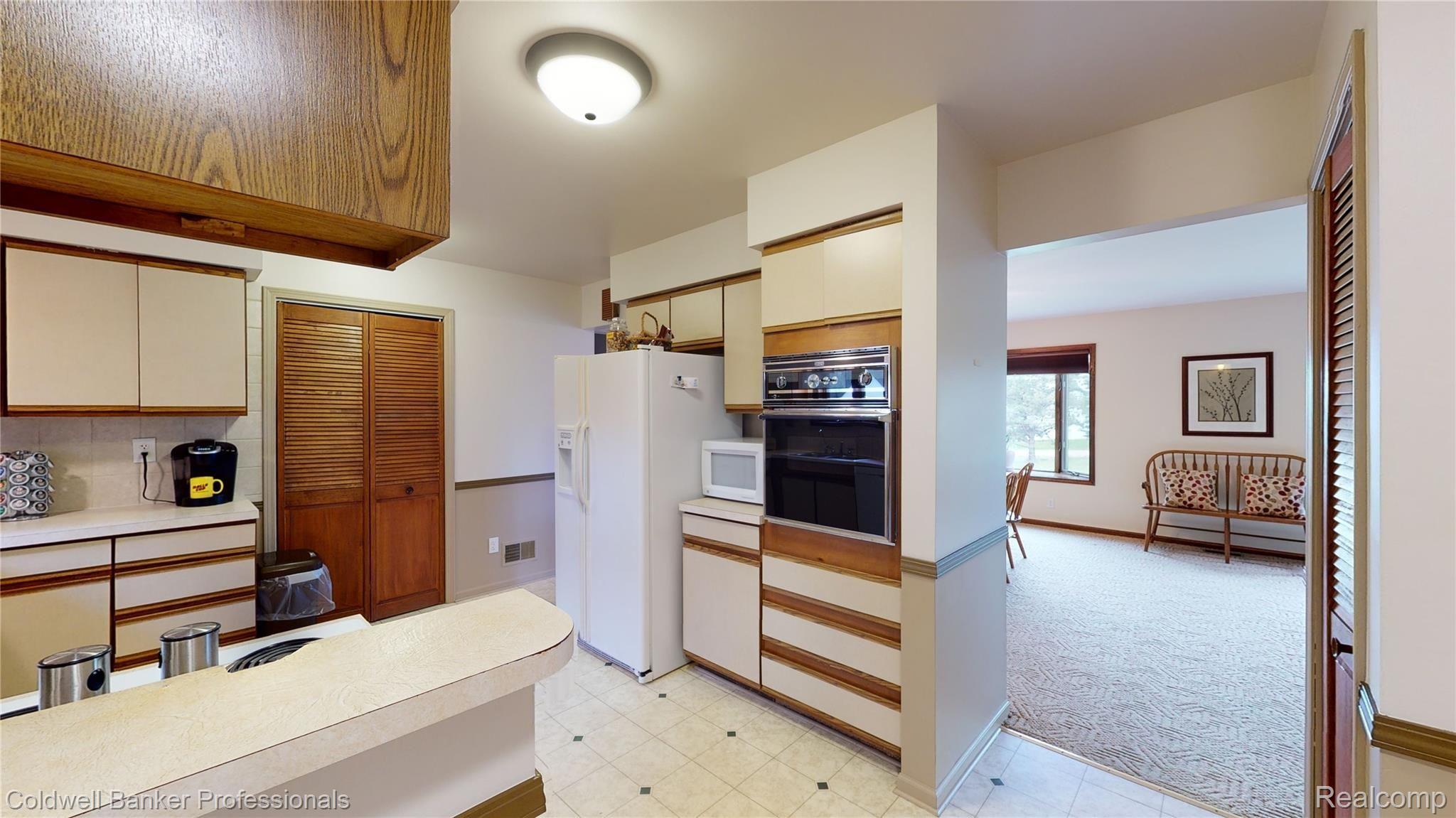1191 West Sutton Road Metamora, MI 48455 - Photo 32 of 63 kitchen from dining.jpg