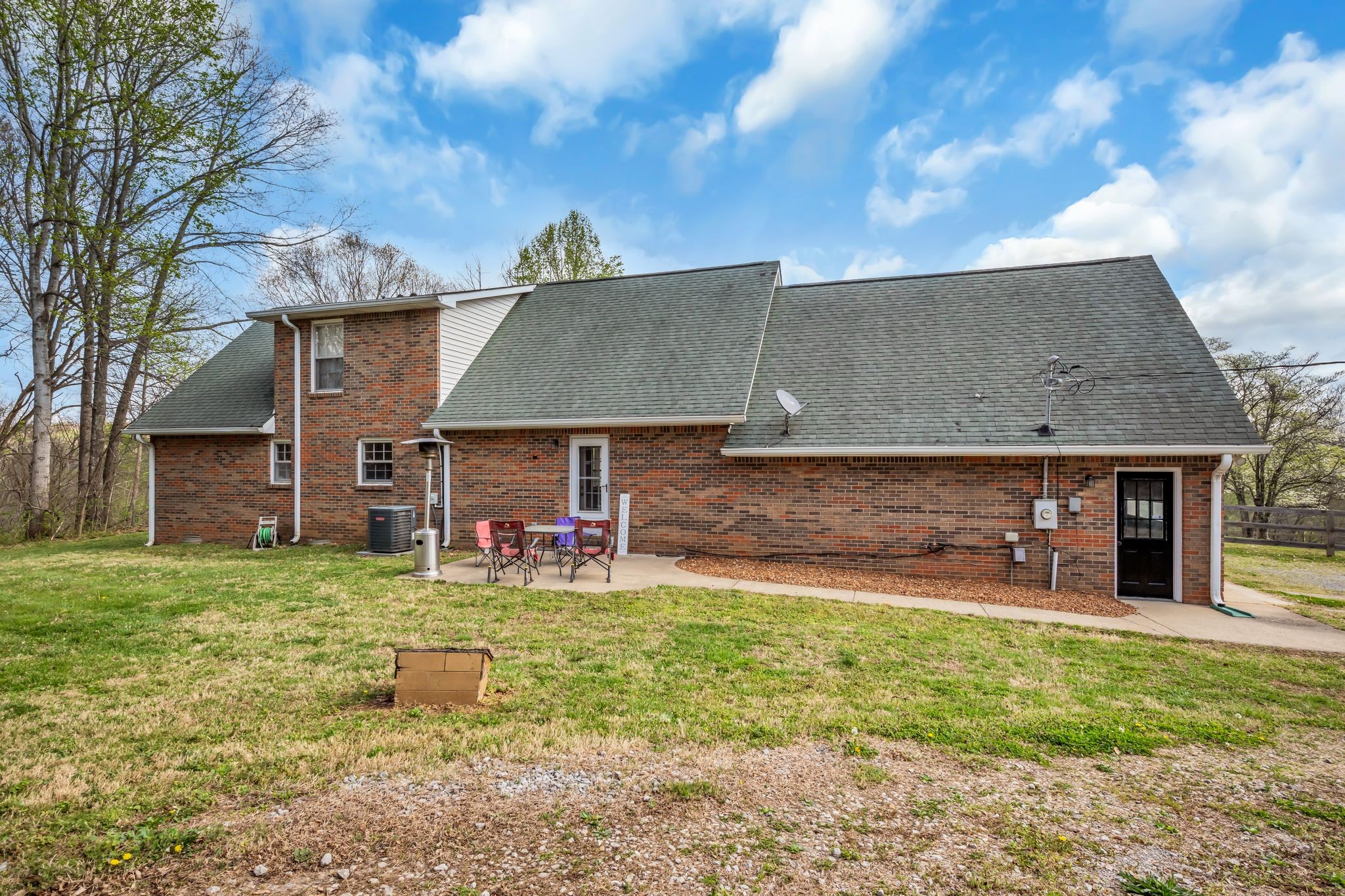 2025 Dunn Chapel Road Cumberland Furnace, TN 37051 - Photo 24 of 37 a view of a house with a yard porch and sitting area