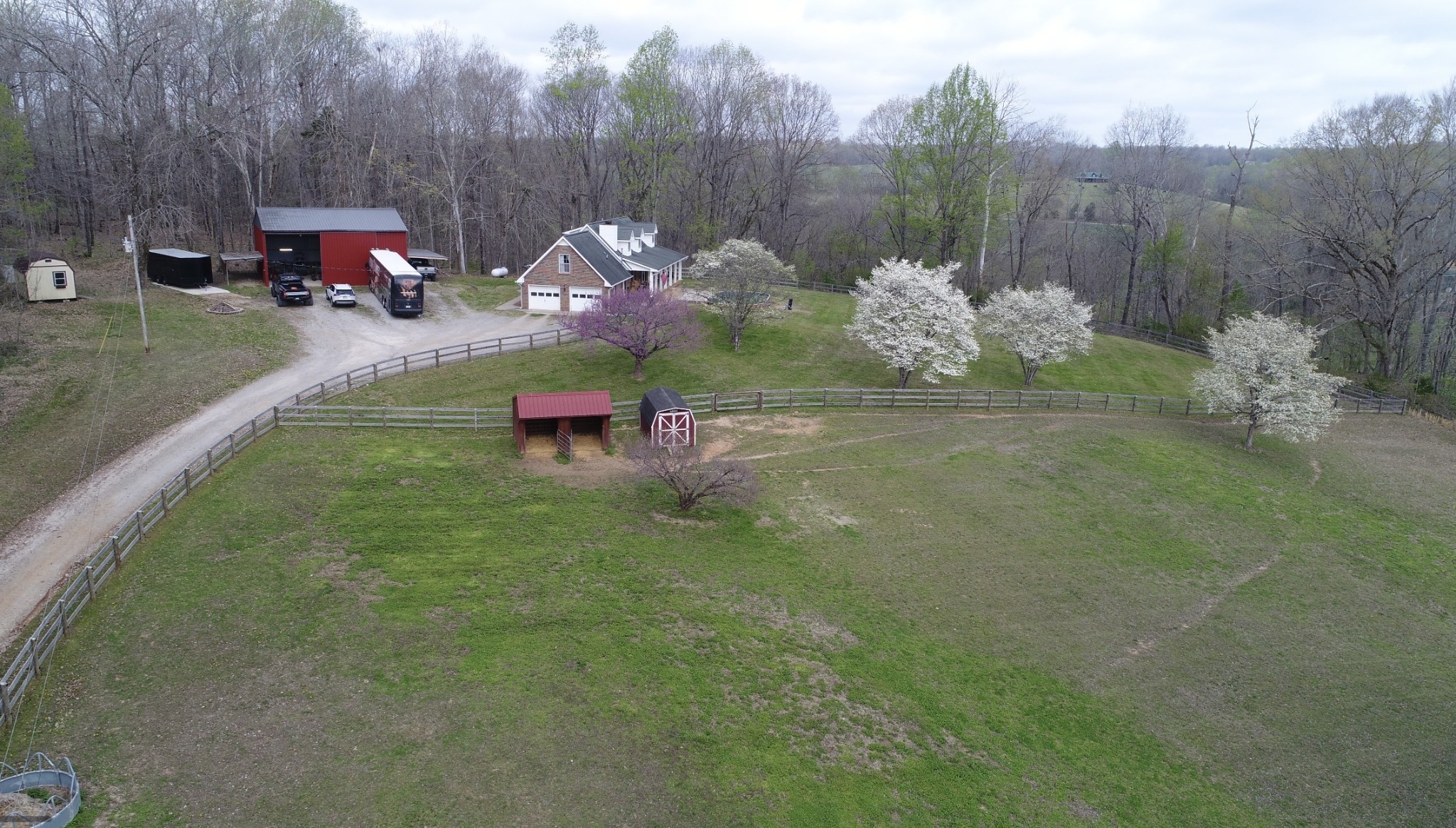 2025 Dunn Chapel Road Cumberland Furnace, TN 37051 - Photo 34 of 37 a backyard of a house with table and chairs