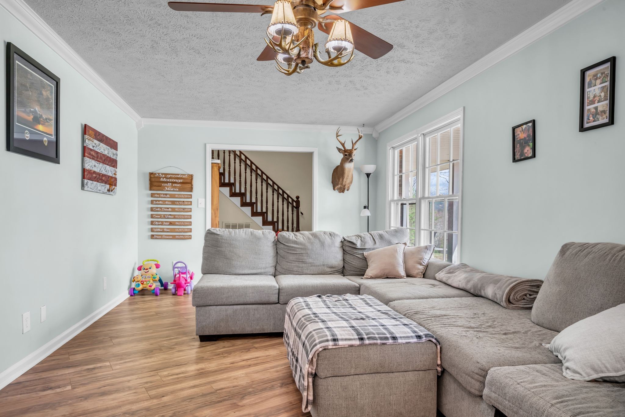 2025 Dunn Chapel Road Cumberland Furnace, TN 37051 - Photo 5 of 37 a living room with furniture and a wooden floor