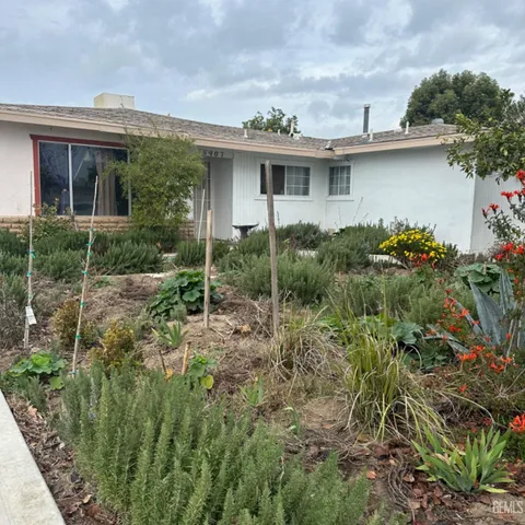 a view of house with outdoor space