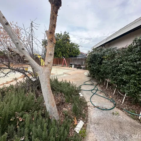 a view of street with parked cars