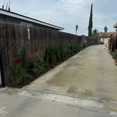 a view of a back yard of the house
