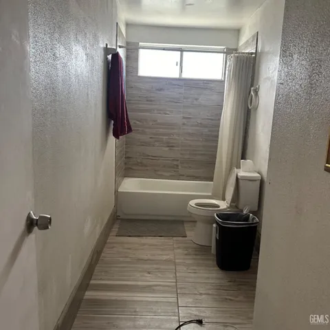 a bathroom with a sink vanity and a mirror