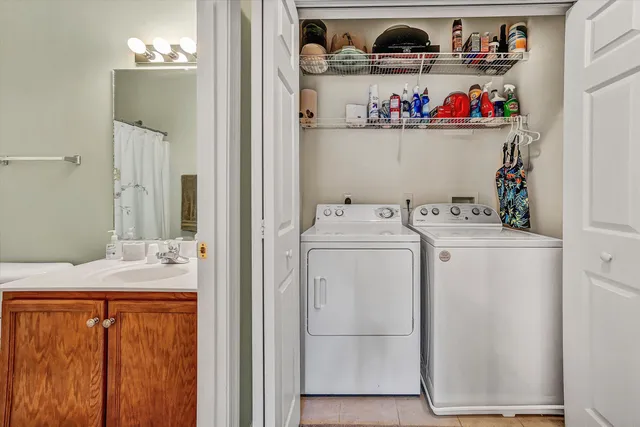 a utility room with dryer and washer